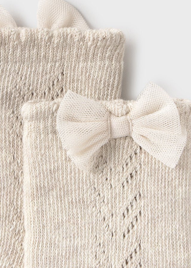 Calceta vestir arena