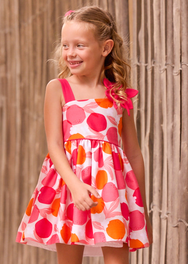 Vestido asímetrico flor clavel